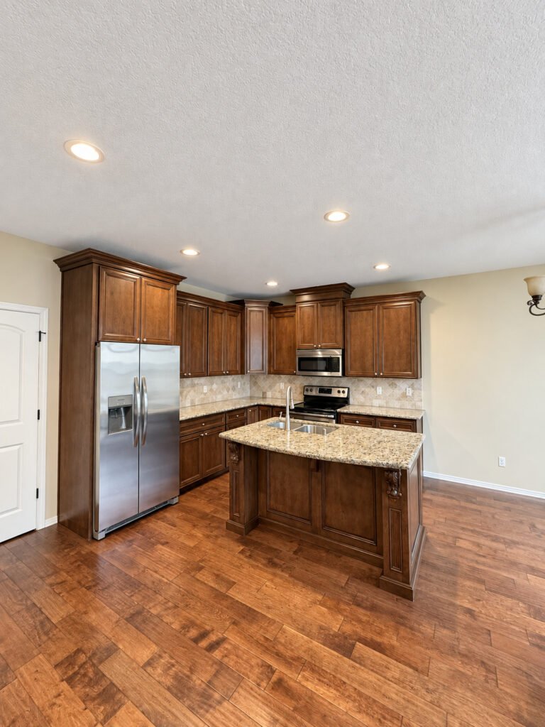 Kitchen with stainless appliances and island