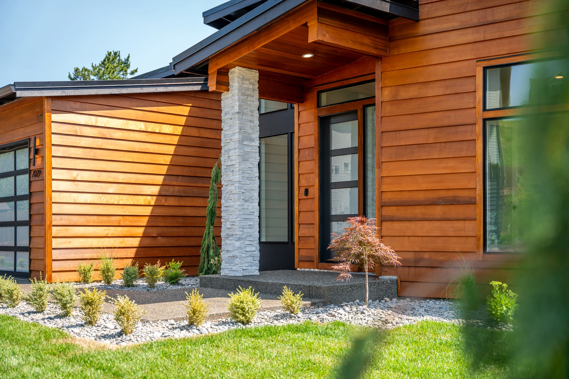 Home entry with cedar siding