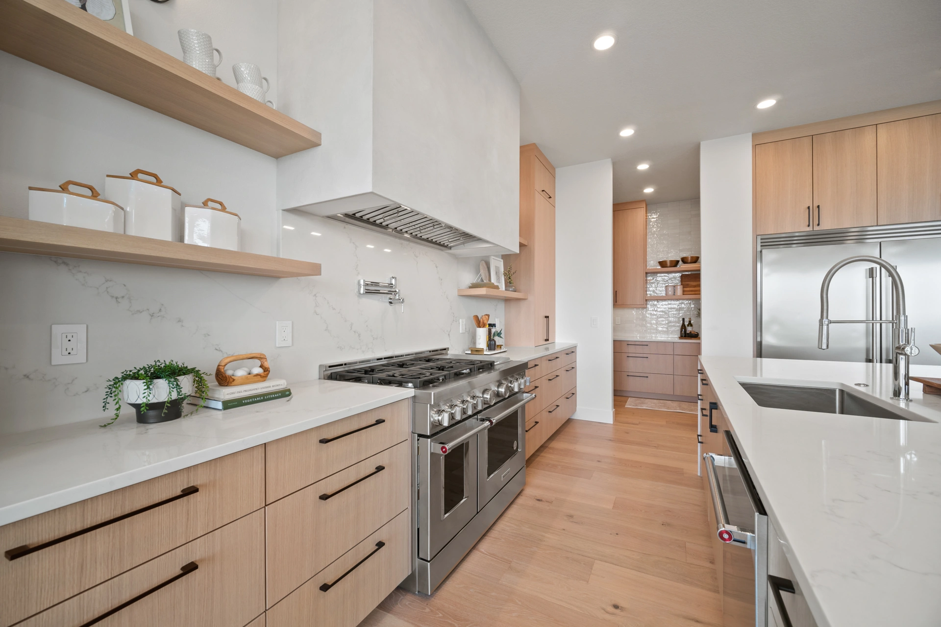 Kitchen with open shelving and range